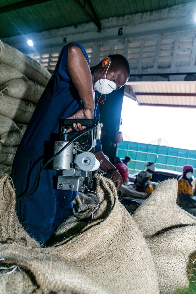 Sealing bags at Rafiki Mill in Tanzania