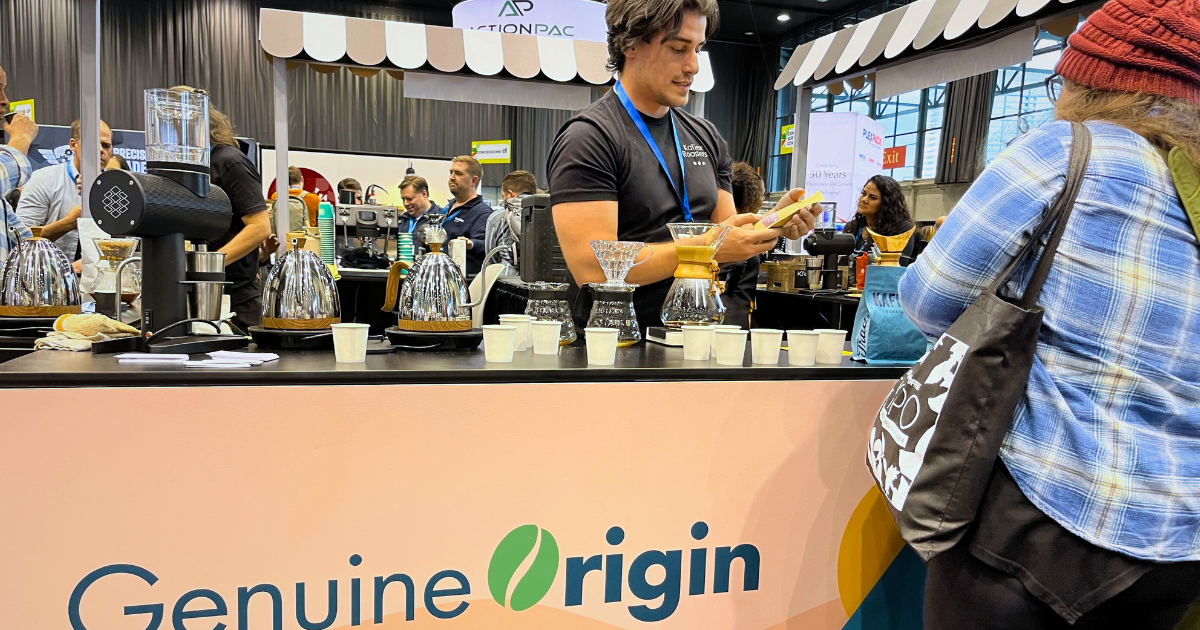 Brewing coffee at Genuine Origin booth at Roaster Village Chicago 2024