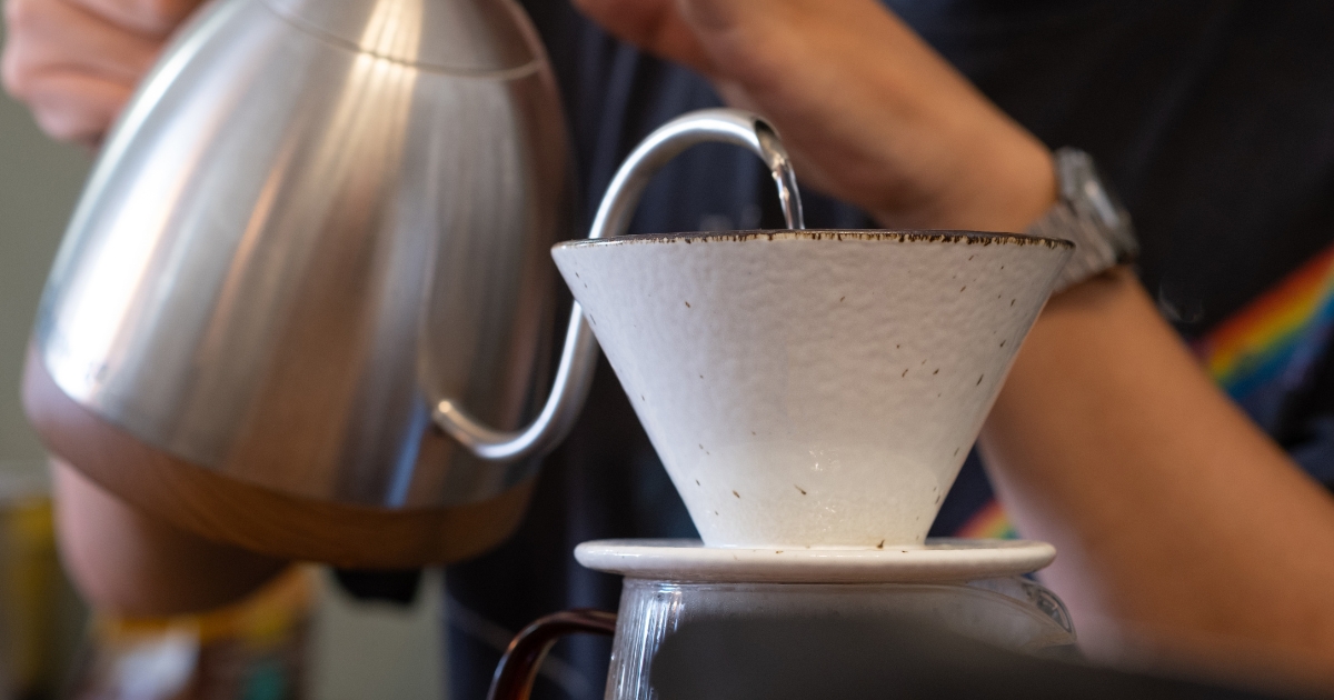 Barista making a pour over