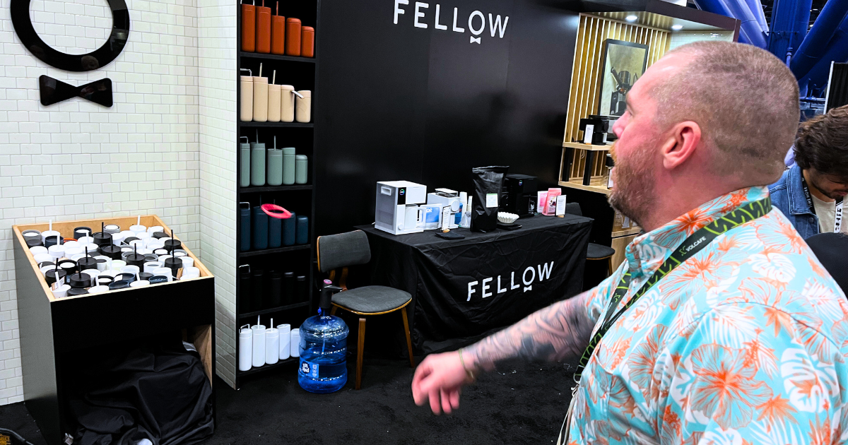 Jay Playing Ring Toss at the Fellows Booth at Coffee EXPO - Genuine Origin Coffee Jay Playing Ring Toss at the Fellows Booth at Coffee EXPO