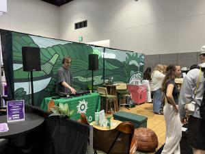 A DJ performing at World of Coffee 2026