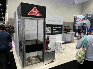 Mahlkonig's money booth at World of Coffee in San Diego