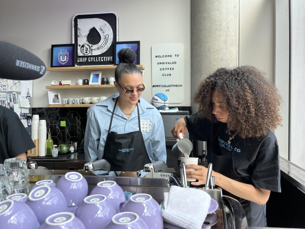 Five time WNBA all-star Kayla McBride behind an espresso machine 